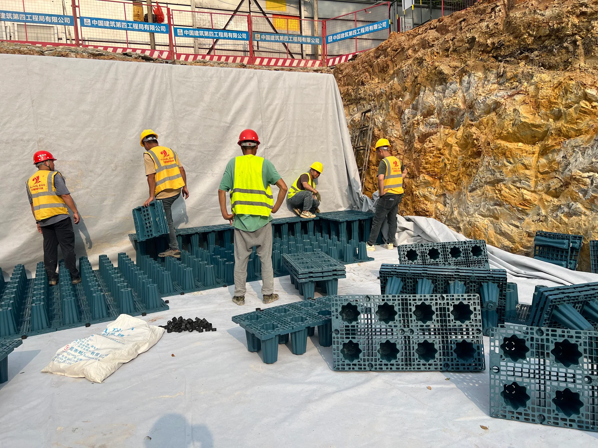 Team preparing underground rainwater modules